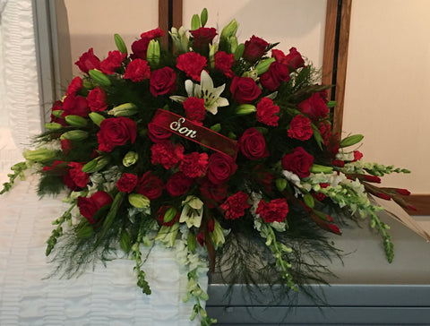 Red Rose, Red Carnation & White Lily Casket Spray